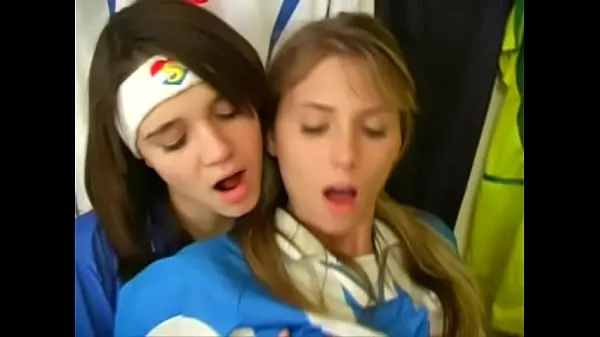 Xem Girls from argentina and italy football uniforms have a nice time at the locker room Clip mới